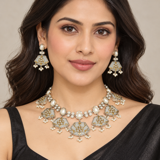 Model wearing Navraee Khanak grey enamel necklace set with matching earrings