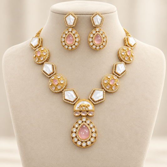 Navraee pink doublet stone and mother-of-pearl necklace with earrings on an ivory jewelry bust