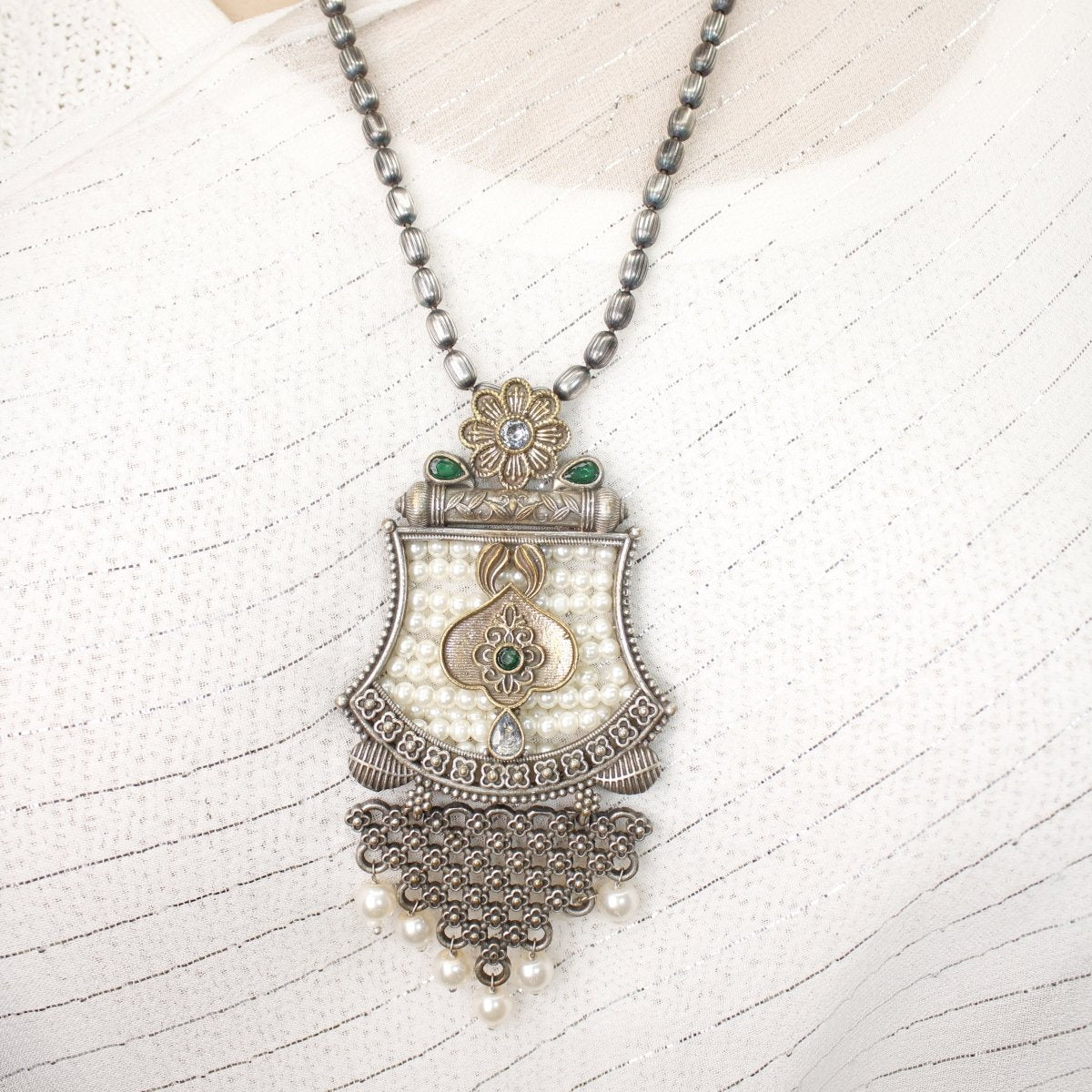 GULDASTA - DUAL - TONE PEARL JAALI ANTIQUE GOLDEN PENDANT SET - GREEN