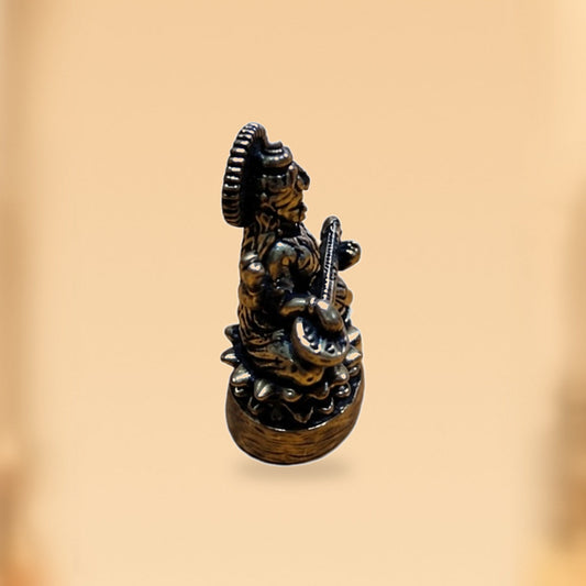 Mini Saraswati Brass Idol with Veena — side view on clean hero-derived studio background