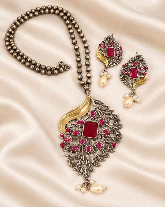 Leaf Peacock Dual Tone Pendant Set - Ruby — AI-styled closeup view