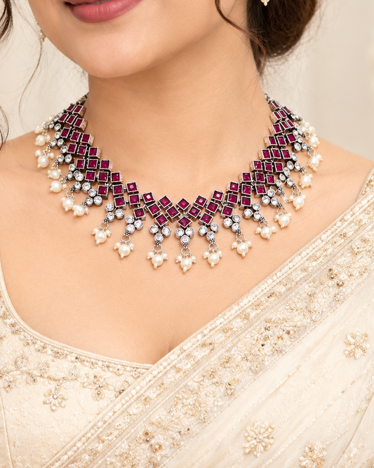 Model wearing Navraee Crystal Necklace Set in magenta