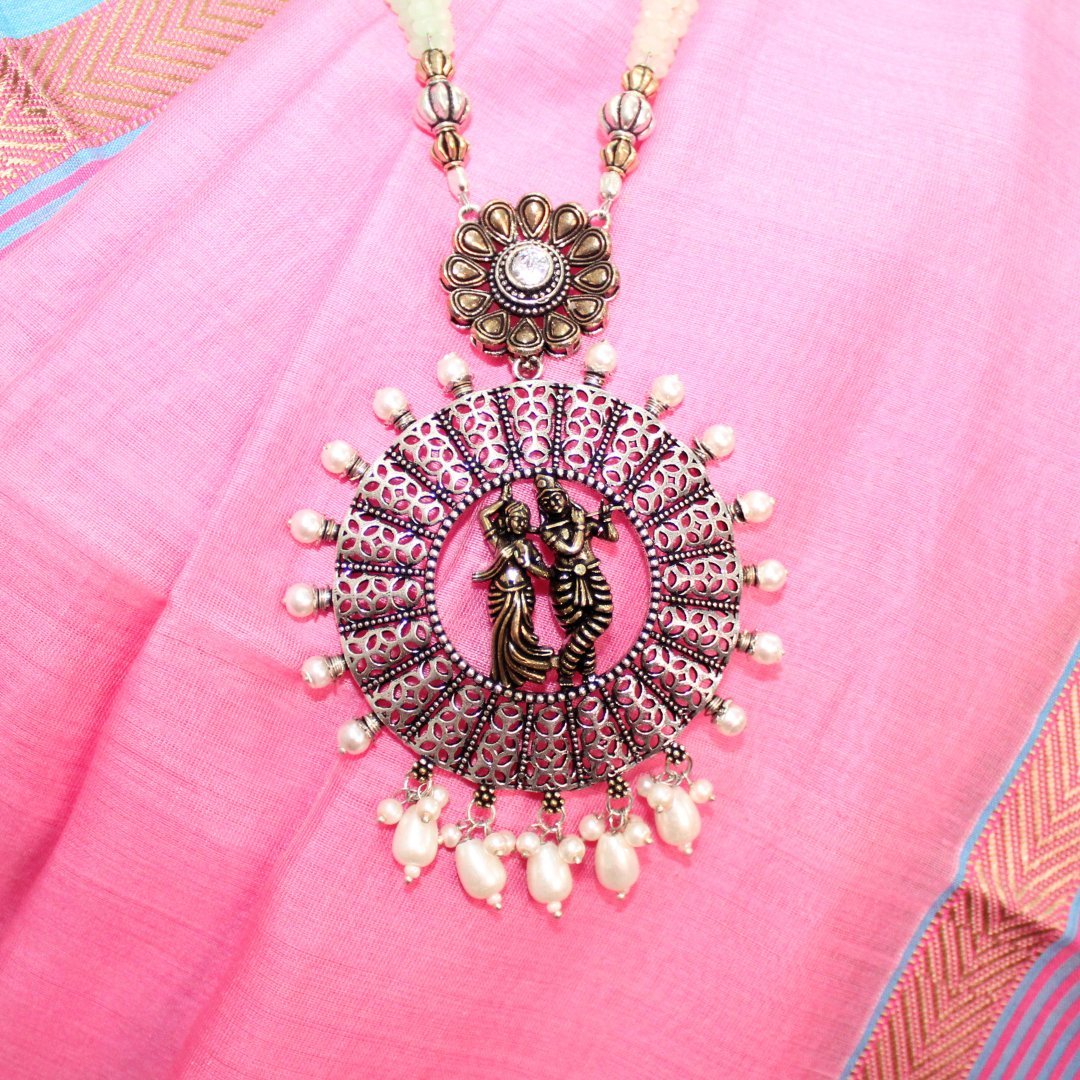 RADHA - KRISHAN DUAL - TONE PENDANT SET - PEACH
