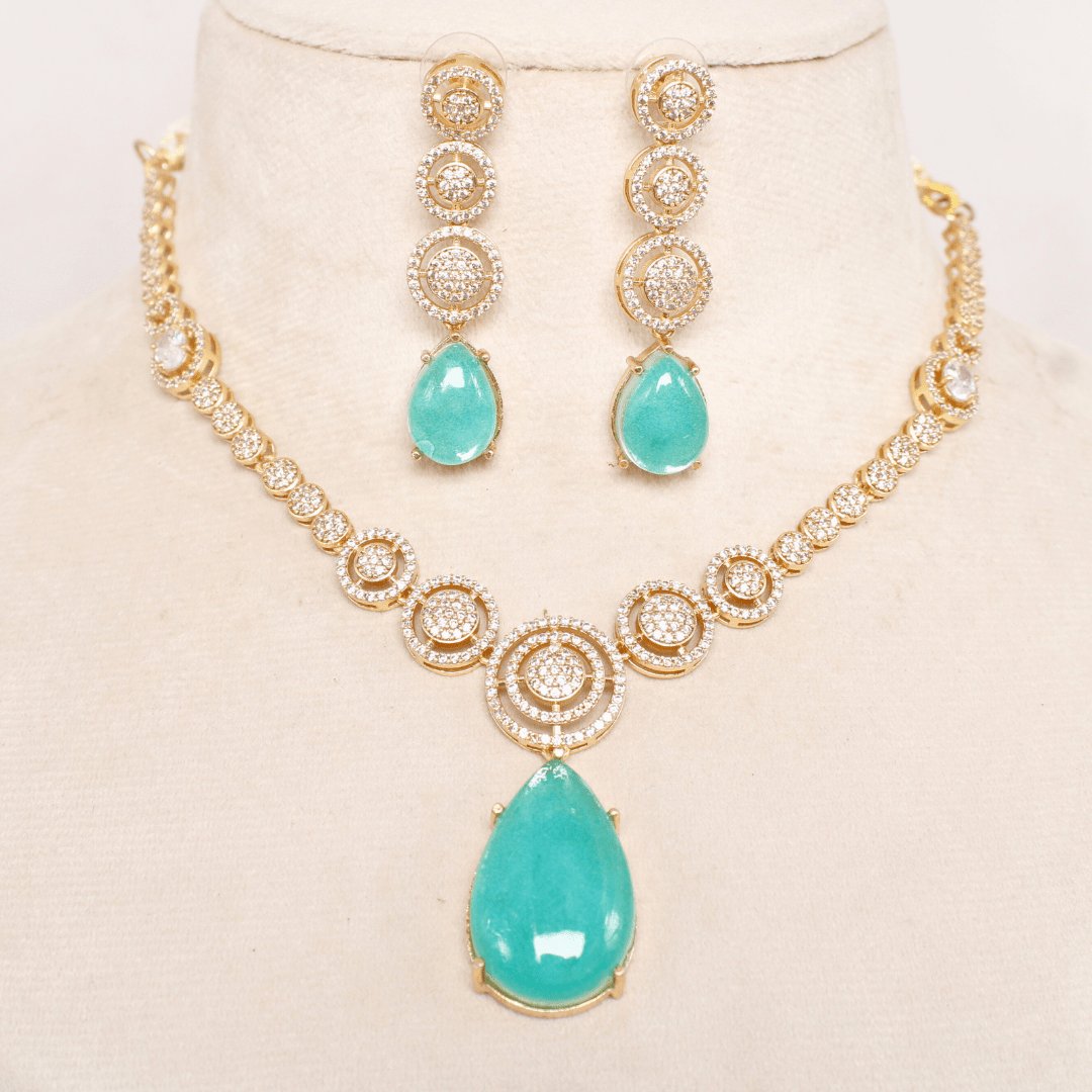 Aqua Green Stone & Ad Necklace Set Online | Gold Plated Party Wear Jewelry featured in Navraee jewellery styling guide