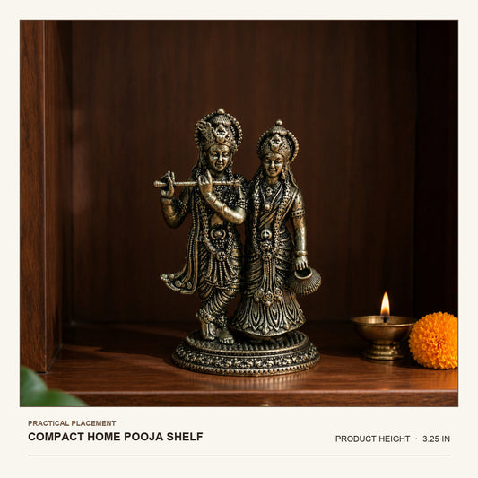 Radha Krishna brass idol shown on a compact home pooja shelf, 3.25 inches high