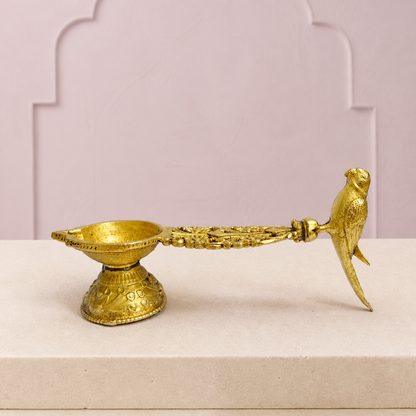 Peacock Handle Brass Diya — premium product hero