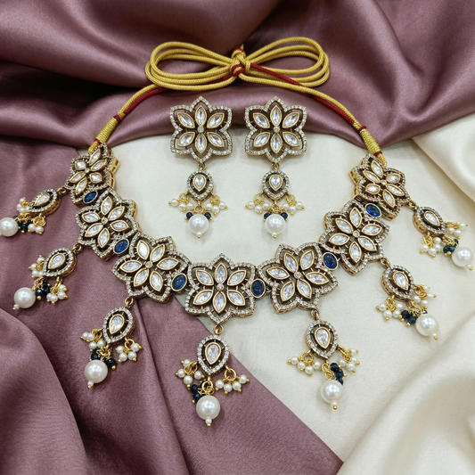 Royal Polki Floral Necklace Set with Blue Stones and Pearls