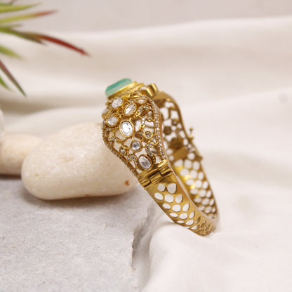 Exquisite Micro Gold Plated Statement Kada with Emerald Green Centerpiece