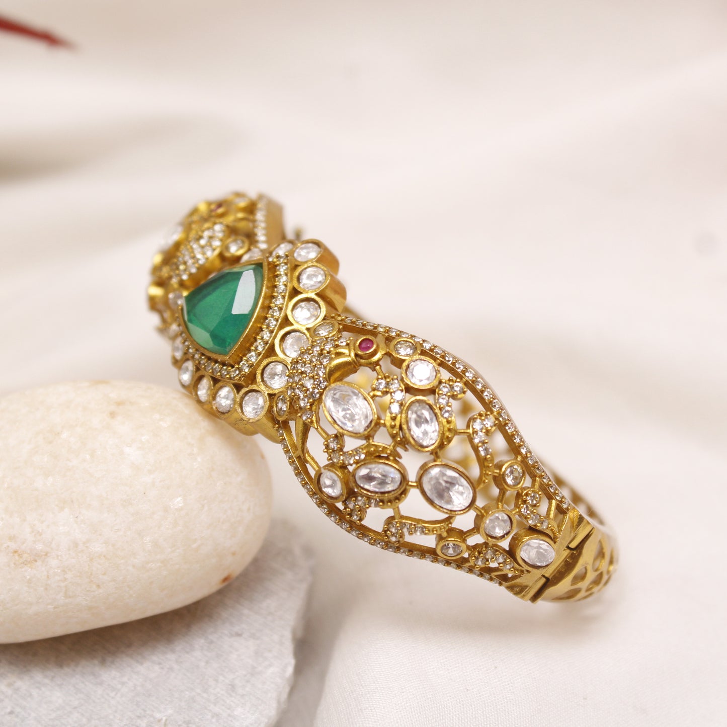 Exquisite Micro Gold Plated Statement Kada with Emerald Green Centerpiece