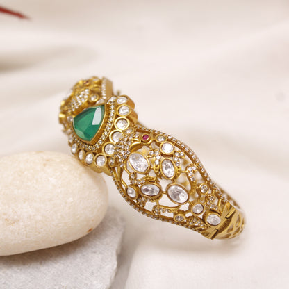 Exquisite Micro Gold Plated Statement Kada with Emerald Green Centerpiece