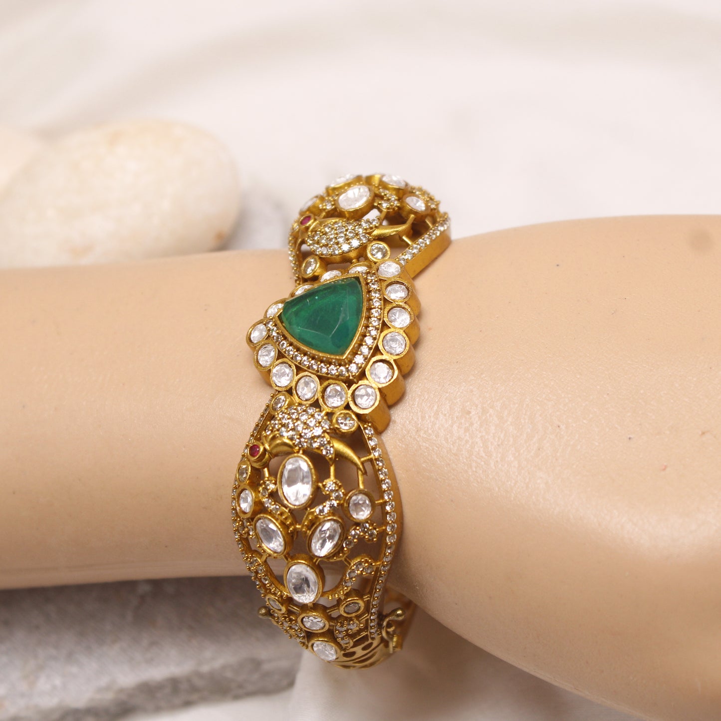 Exquisite Micro Gold Plated Statement Kada with Emerald Green Centerpiece