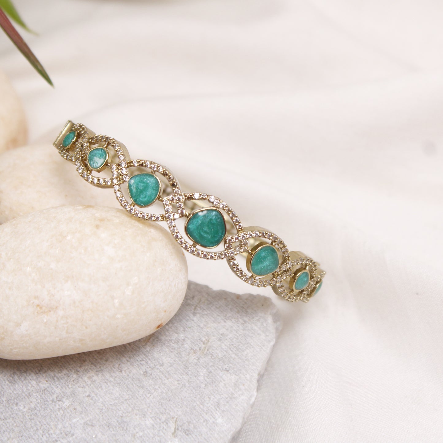 Elegant Micro Gold Plated AD Kada with Green Stones