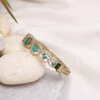 Elegant Micro Gold Plated AD Kada with Green Stones