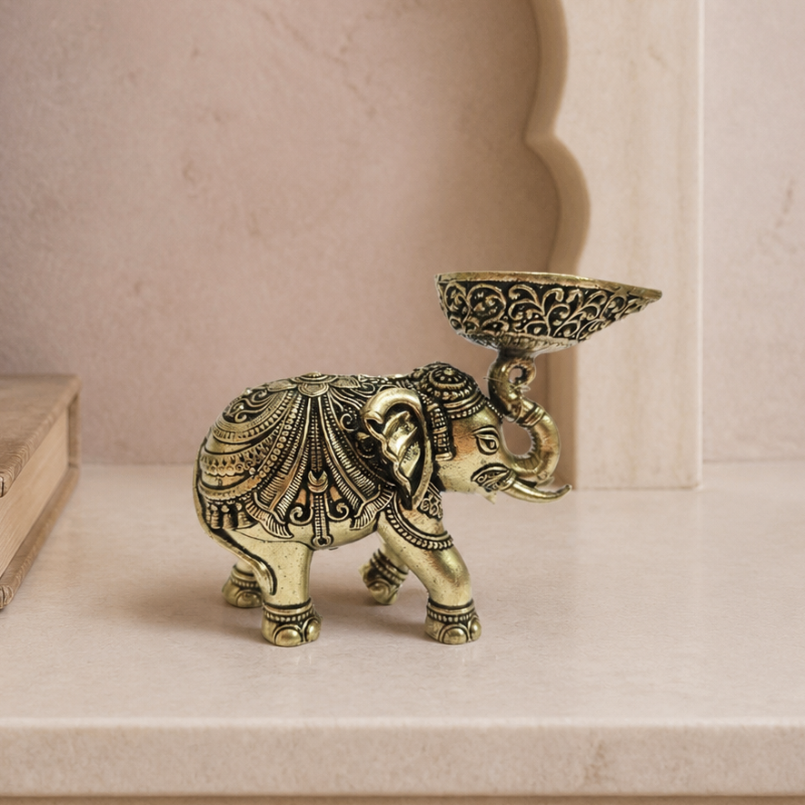 Antique Brass Elephant Diya dimensions: 3.5 inch height, 1.25 inch width, 2.5 inch depth, 84 grams