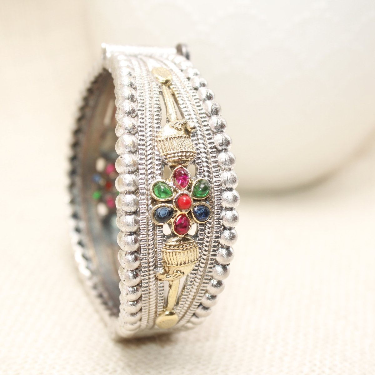 CHANDINI SILVER REPLICA DUAL-TONE STONE FLOWER KADA