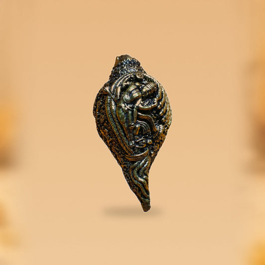 Decorative Brass Conch with Devotional Motifs — side view on clean hero-derived studio background