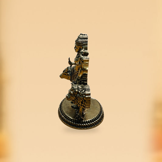 Antique Brass Devotional Idol with Elephant & Lion — side view on clean hero-derived studio background
