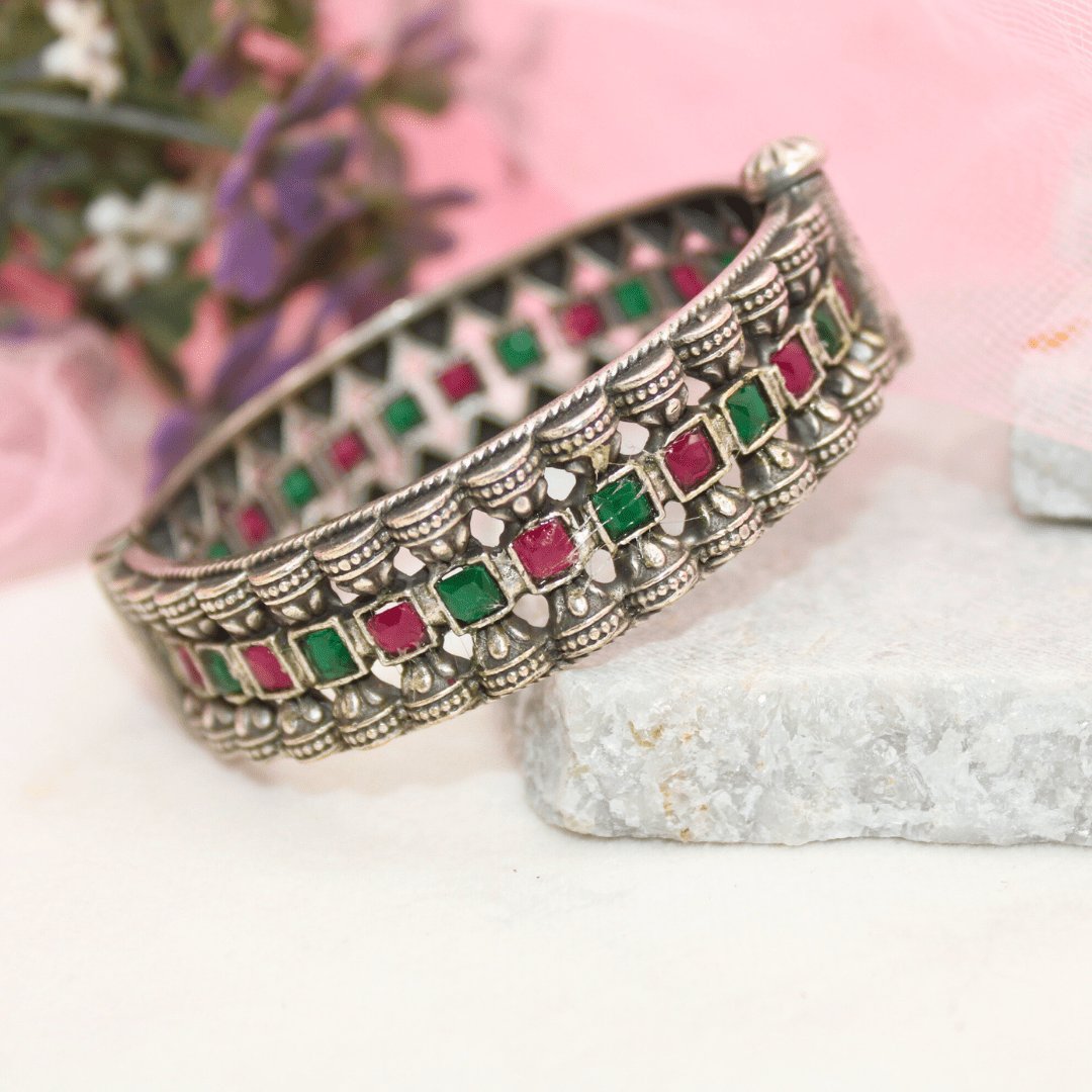 KASTURI-OXIDISED SILVER LOOK ALIKE KADA-RED & GREEN