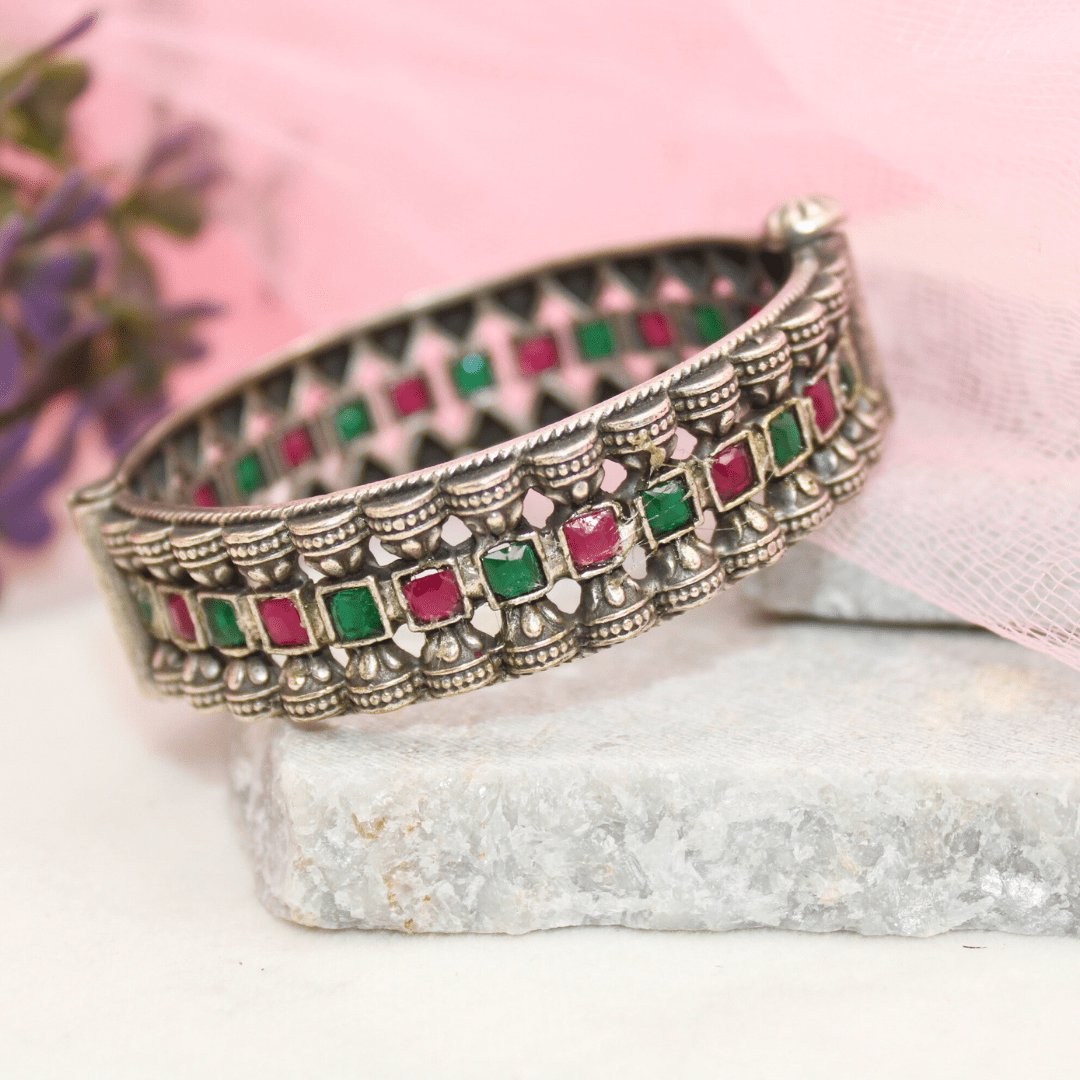 KASTURI-OXIDISED SILVER LOOK ALIKE KADA-RED & GREEN