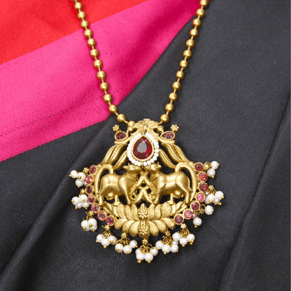 Nandi Divine Antique Pendant Set – Matte Gold with Pink Kundan & Pear