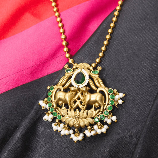 Nandi Pair Antique Pendant Set – Matte Gold with Emerald Green Kundan & Pear
