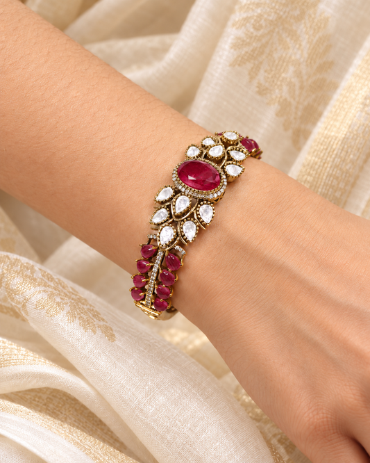 Ruby Red Oval Cabochon Polki Leaf Kada — AI-styled model view; fit estimated from original reference photograph