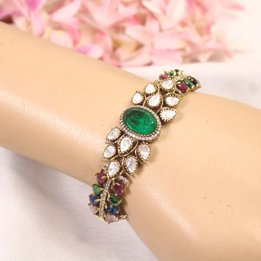 Emerald Navratna Oval Cabochon Polki Leaf Kada – wrist view