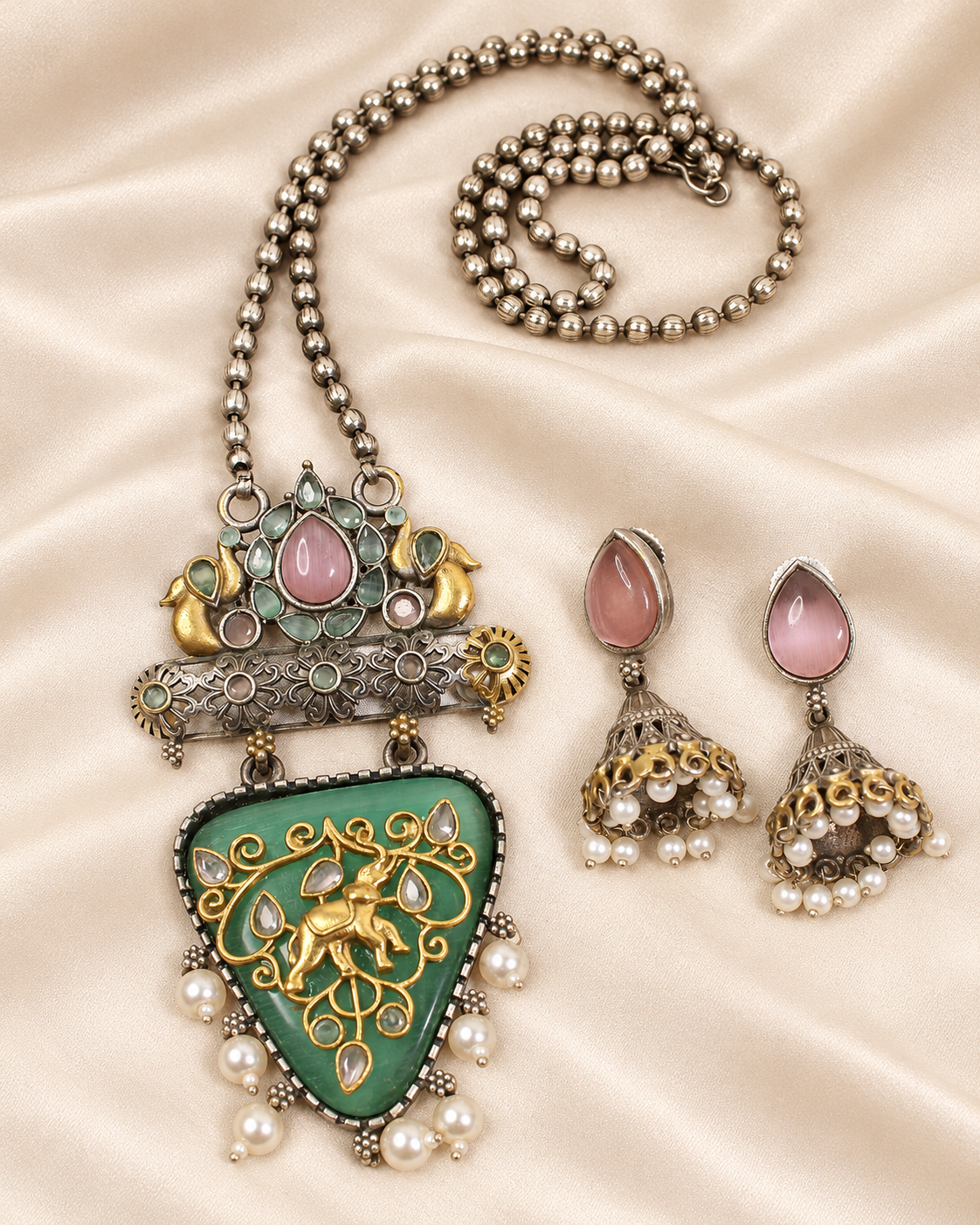 Dancing Figure Triangular Pendant Set - Green and Pink — AI-styled closeup view