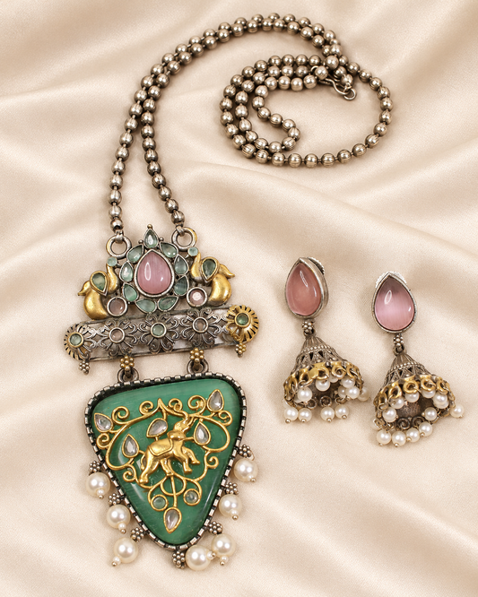 Dancing Figure Triangular Pendant Set - Green and Pink — AI-styled closeup view
