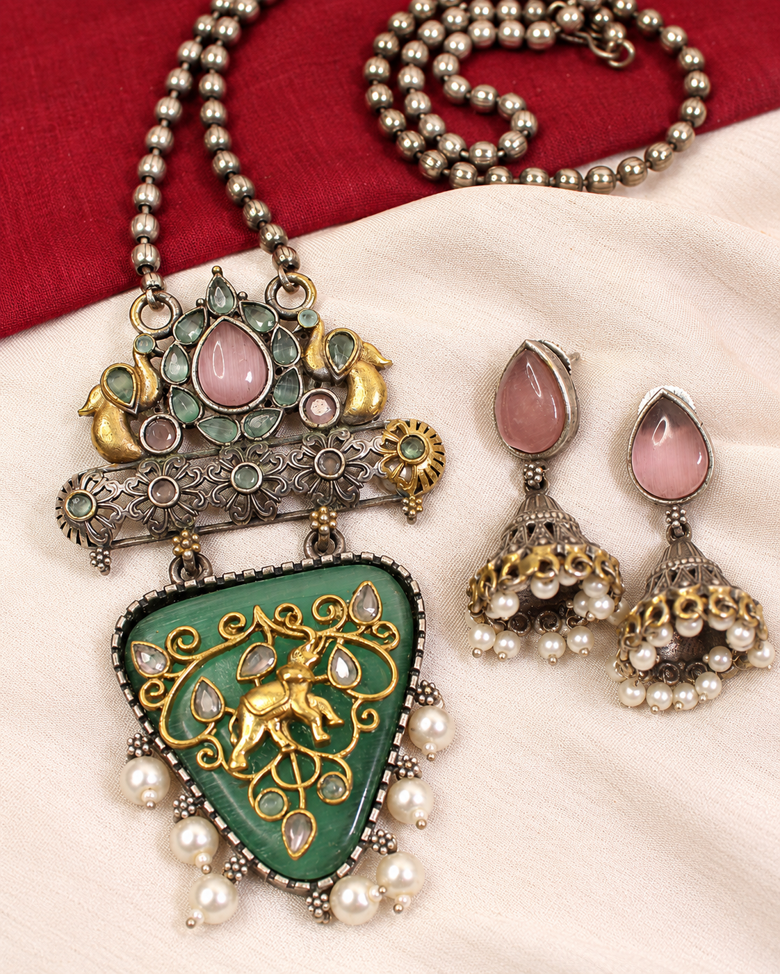 Dancing Figure Triangular Pendant Set - Green and Pink — AI-styled ornament detail view