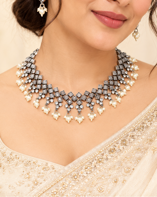 Model wearing Navraee Crystal Necklace Set in grey