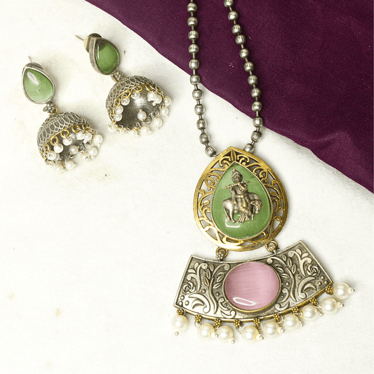 RAJWADI KRISHNA COW MOTIF PENDANT SET – GREEN & PINK STONE OXIDISED TEMPLE JEWELRY