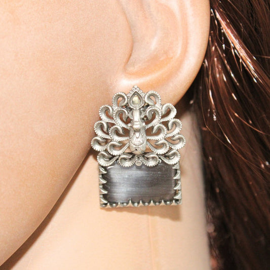 SILVER LOOK ALIKE DANCING PEACOCK STONE STUD - GREY