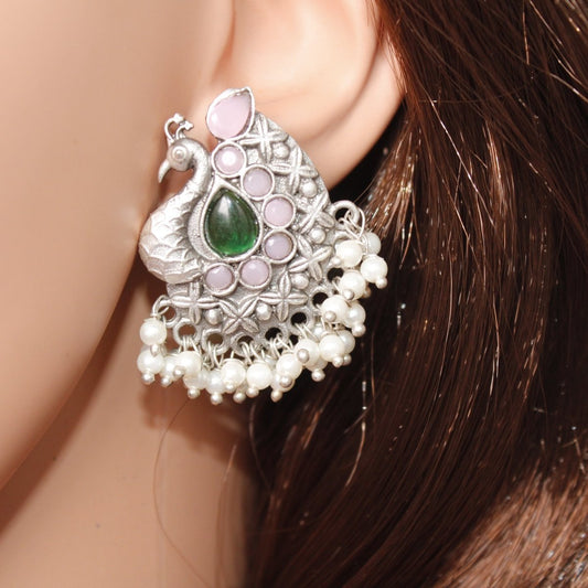SILVER LOOK ALIKE PEACOCK STUDS-GREEN & PINK