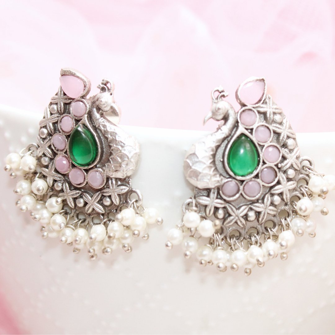 SILVER LOOK ALIKE PEACOCK STUDS-GREEN & PINK