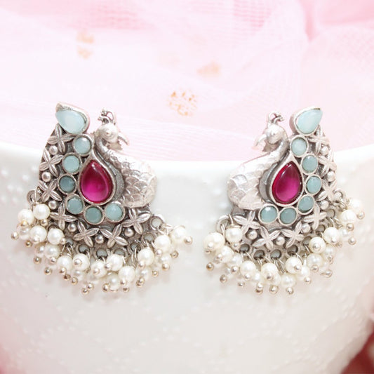 SILVER LOOK ALIKE PEACOCK STUDS - RED & BLUE